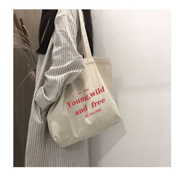 Young, Wild, and Free Lightweight Quote Canvas Tote Bag